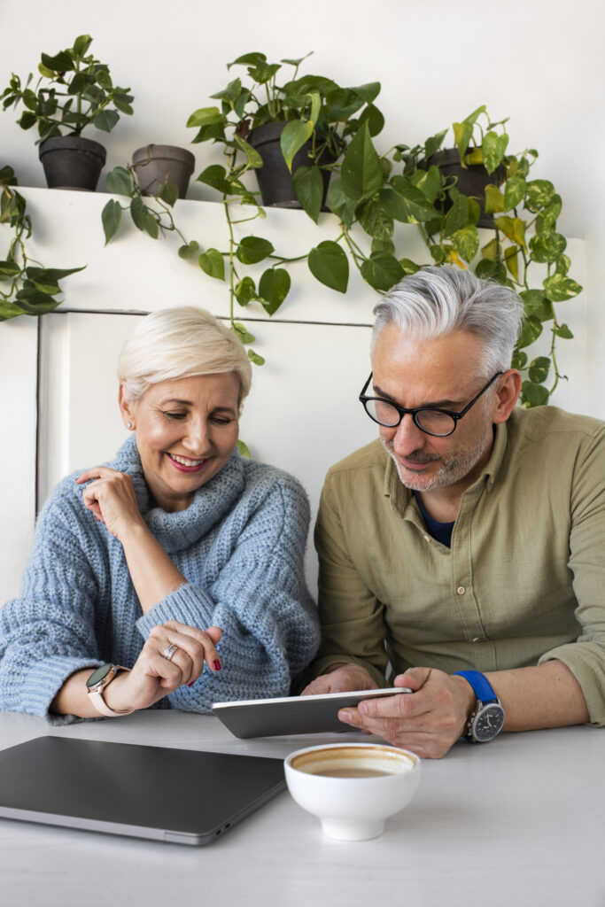 Mature couple using a tablet